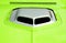 Custom hood scoop on neon green car
