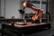 custom robotics project, with robotic arm and tools custom-designed to perform specific tasks