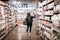 Customer choosing grocery products on display at Whole Foods Market in Oregon State