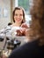 Customer Looking At Waitress In Cafeteria