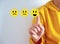 Customer satisfy rate service and Satisfaction concept, A finger touching the virtual screen on the happy Smiley star icon to give