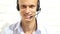 Customer Service Employee Smiling with Headphones