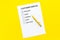 Customer service form with mark Exellent close up on yellow background top view copy space