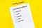 Customer service form with mark Exellent close up on yellow background top view space for text