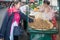 Customers around a vendors stall