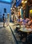 Customers at cafe tables on a Montmartre evening, Paris, France