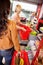 Customers carrying basket while shopping