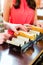 Customers eating Hotdog in fast food snack bar