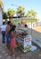 Customers eating stuffed Mussels Midye Dolma at Kizkalesi Beach