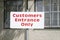 Customers entrance only sign at shop factory work place