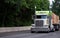 Customized classic big rig semi truck with flat bed trailer tran