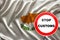 Customs sign, stop, attention on the background of the silk national flag of Cyprus, the concept of border and customs control,