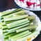 Cut Cucumber Sticks and Sliced Crab Sticks or Kanikama on White Plates. Ingredients for Salads Or Hosomaki, California, Cucumber