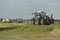 Cut grass chopping and silage with tractors