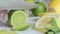 Cut the lime into slices with a knife. Cooking homemade mojito, close-up