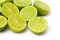 Cut limes on white background