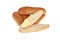 Cut loaf of bread with butter and other loaves isolated on a white background