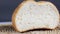 Cut off edge of a white loaf close-up. A piece of bread.