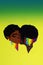 The cut out of colored paper kissing black women on the green background