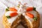 Cut a piece of carrot cake decorated with bunny close-up. horizontal
