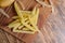 Cut pieces fresh potato on wooden cutting board