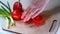 Cut Red Tomato in the morning light. Cut fresh vegetables for cooking in the morning light. Macro. Tomato cutting close