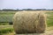 Cut sides of road like hay in a roll