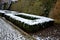 cut squares of flowerbed edging in a historic garden