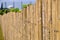 Cut to length bamboo used as a fencing wall.