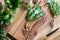 Cut-up dandelion root on a wooden cutting board