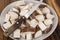 Cut up yucca root in white bowl,vegetable