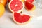 Cut and whole grapefruits
