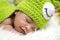 Cute adorable newborn baby sleeping on furry mat.motherhood and parenting concept.