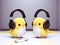 Cute and adorable yellow baby chickens with earphones in head