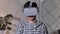 Cute advanced boy wearing VR headset to start game