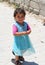 Cute Afghan girl smiling and posing to camera