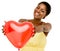 Cute african american woman holding red balloon heart valentines