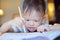 Cute Asian 2 years old toddler boy writing / drawing with pencil, Preschooler doing homework, Creative play for toddler