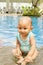 Cute Asian baby at swimming pool