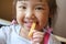 Cute Asian Girl Happy eating