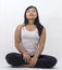 Cute asian girl on isolated background on meditation