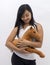 Cute asian girl with a teddy horse