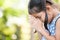 Cute asian little child girl praying with folded her hand