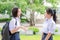 Cute Asian Thai high schoolgirls student talking