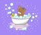 Cute baby bear swims in the bathtub