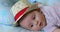 Cute Baby Boy Aged 5 Month Old With His Straw Hat