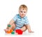 Cute baby boy playing with toys over white background