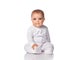Cute baby child sitting on white floor background