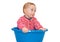 Cute baby dressed and sit in a blue basin