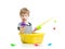Cute baby fishing and sitting inside washbowl